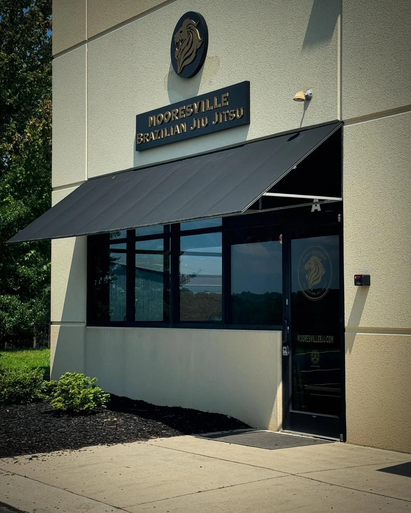 The Mooresville Brazilian Jiu-Jitsu academy at 243 Overhill Dr Suite A — exterior with the Mooresville Brazilian Jiu-Jitsu sign